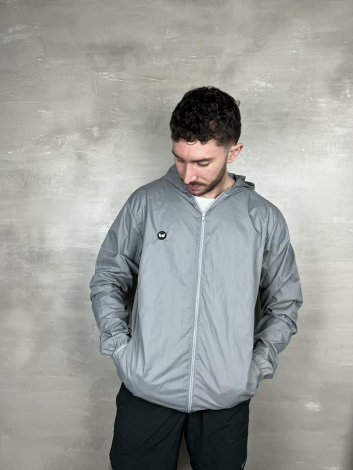 Chaqueta cortavientos unisex - Gris Claro