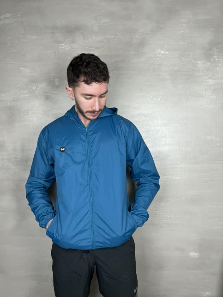 Chaqueta cortavientos unisex - Azul Petroleo