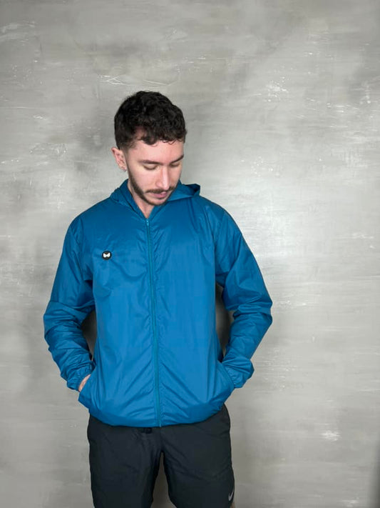 Chaqueta cortavientos unisex - Azul Petroleo