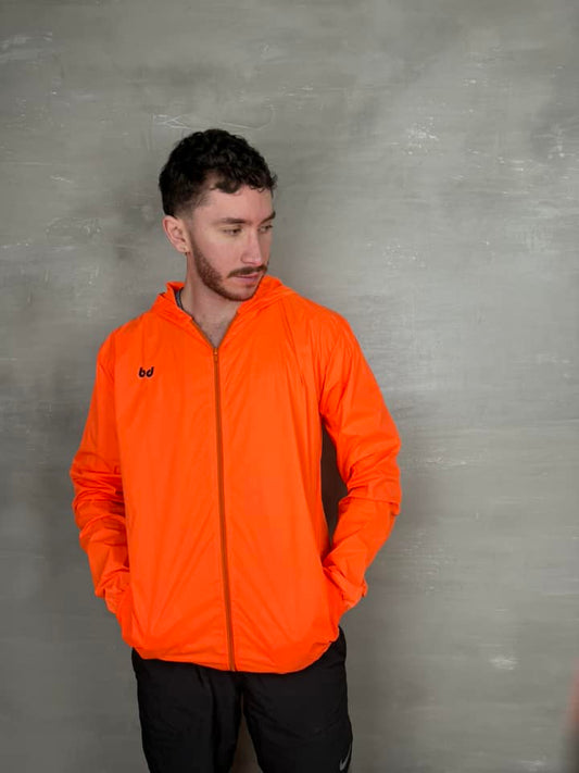 Chaqueta cortavientos unisex - Naranja Neón