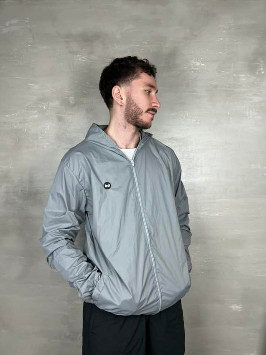 Chaqueta cortavientos unisex - Gris Claro