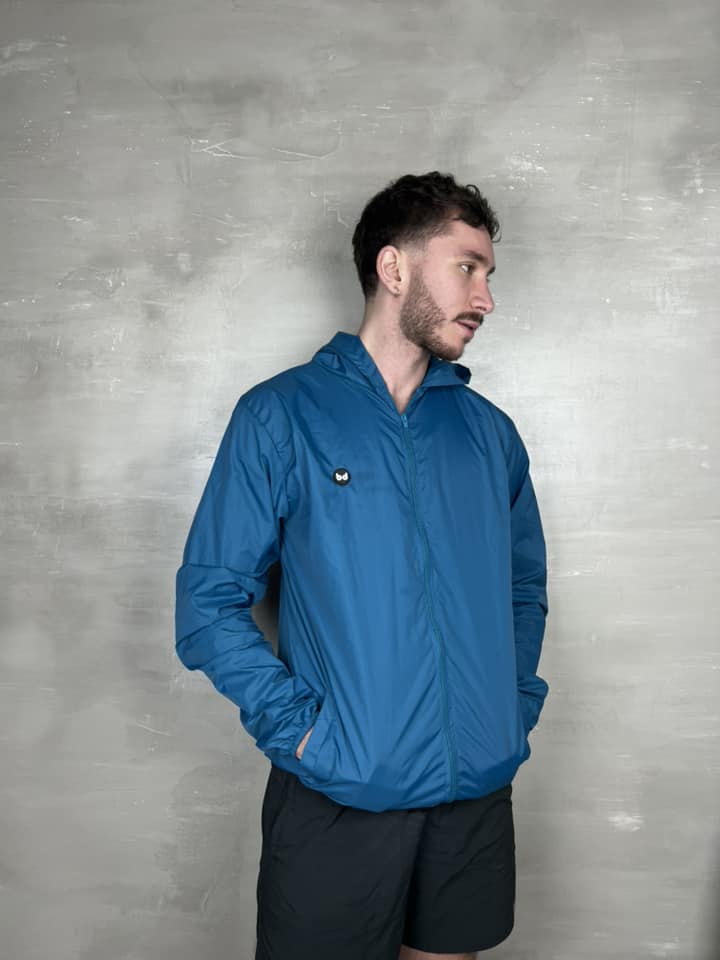 Chaqueta cortavientos unisex - Azul Petroleo